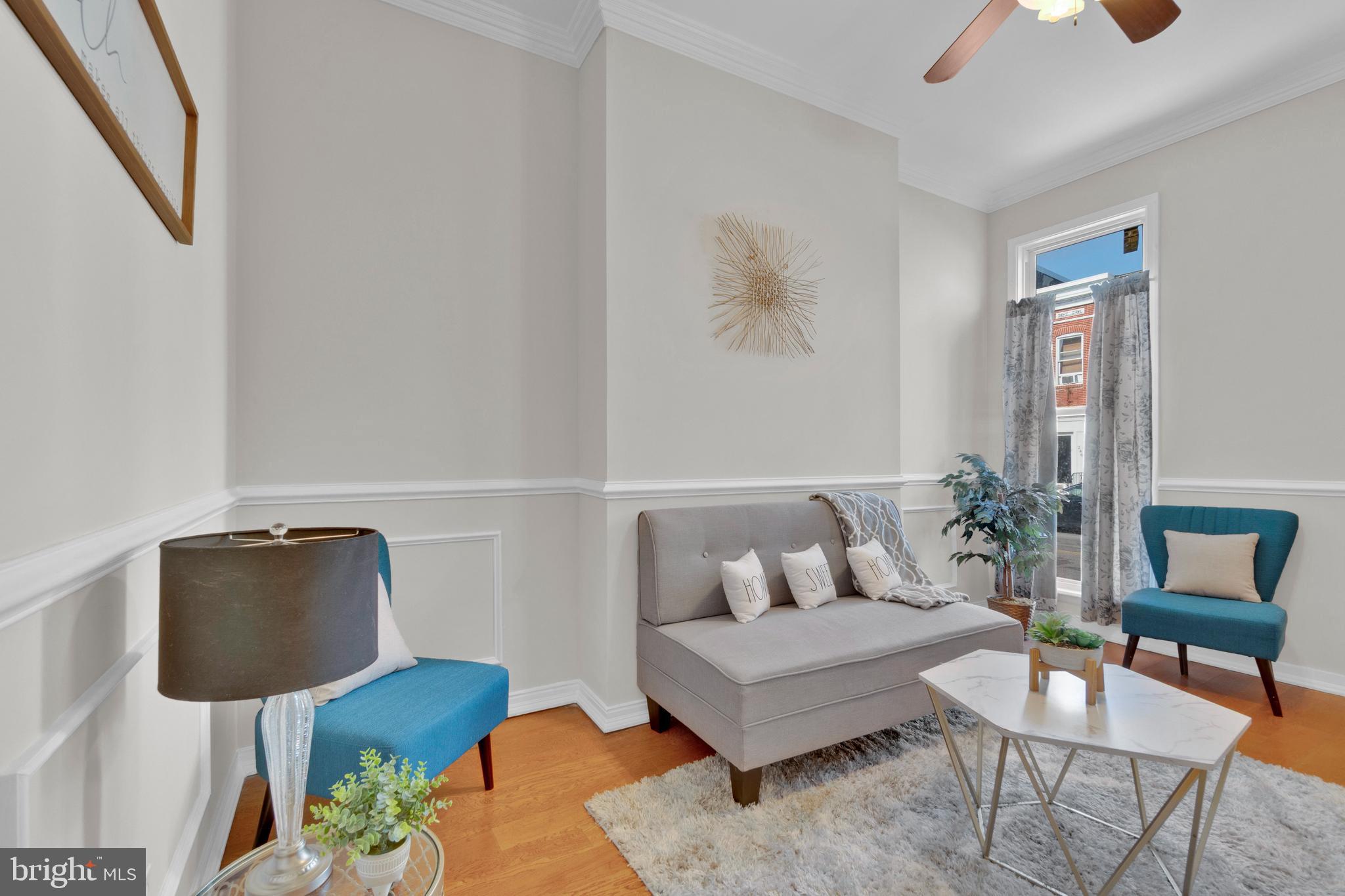 255 South Conkling Street Baltimore, MD 21224 - Photo 7 of 33 a living room with furniture and a potted plant