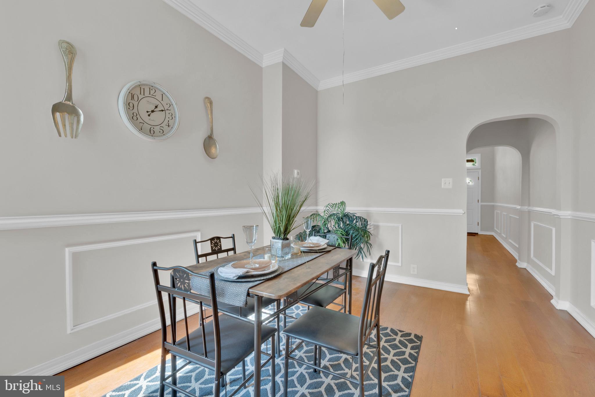 255 South Conkling Street Baltimore, MD 21224 - Photo 9 of 33 a view of a dining room with furniture and wooden floor