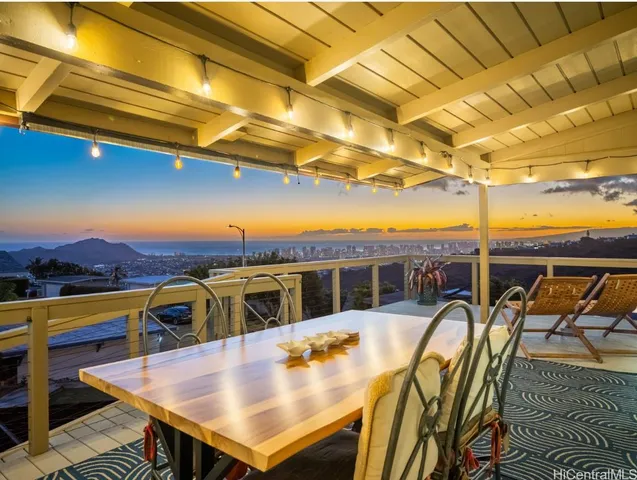 a view of a patio with swimming pool