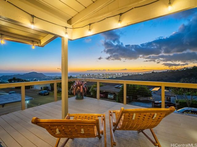 a view of a patio with swimming pool