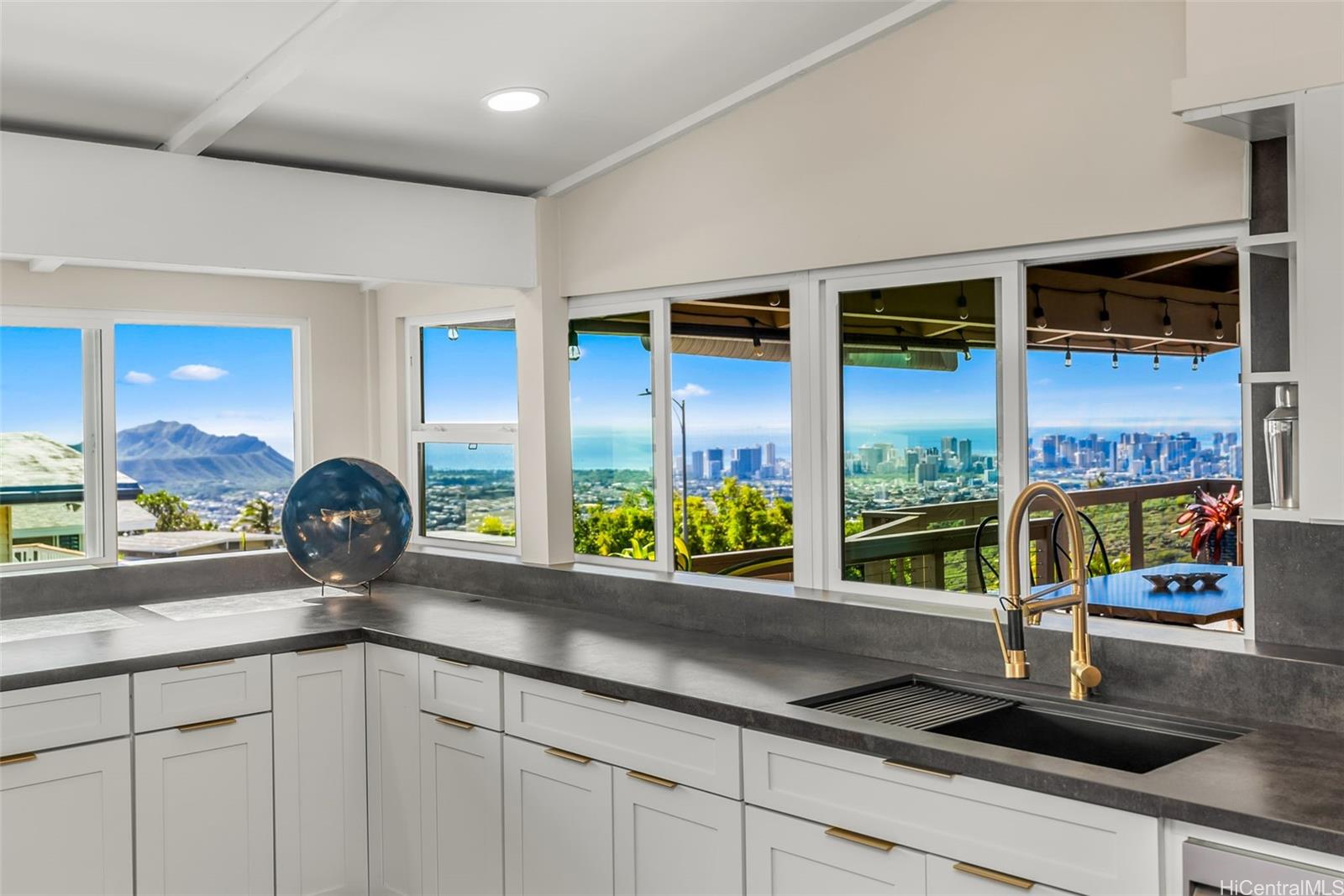 1947 Alaeloa Street Honolulu, HI 96821 - Photo 8 of 25 a kitchen with a sink and a large window