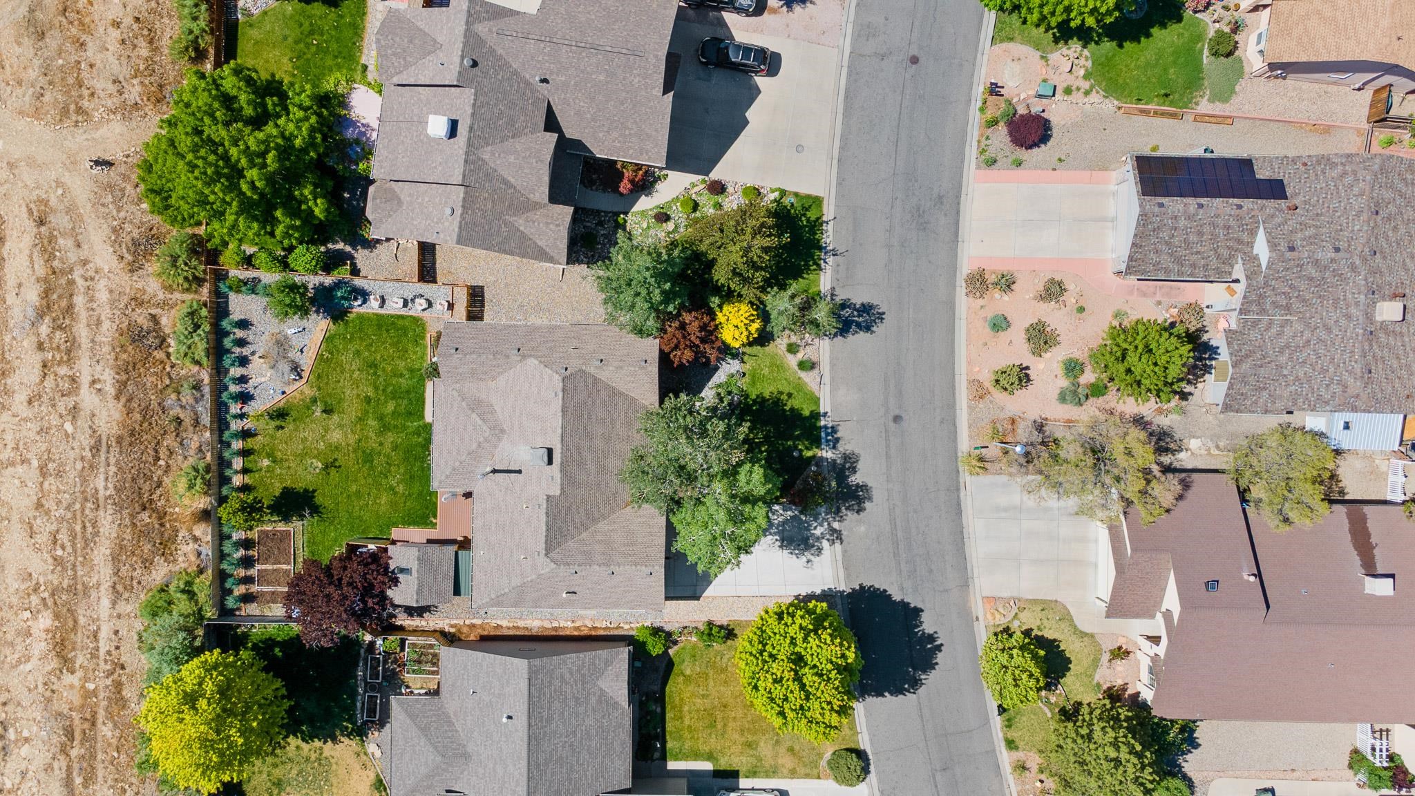 398 Butte Court Grand Junction, CO 81507 - Photo 29 of 33 an aerial view of a house with a yard and garden