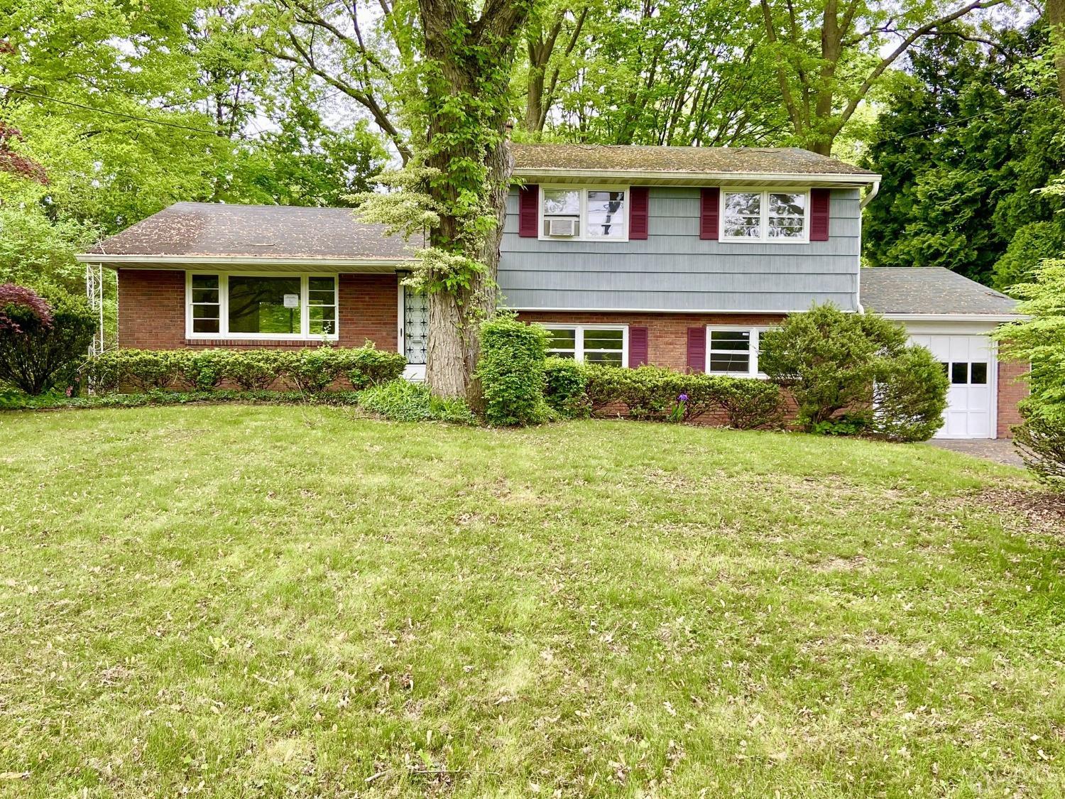 12 Federal City Road Ewing, NJ 08638 - Photo 1 of 16 a front view of a house with a yard