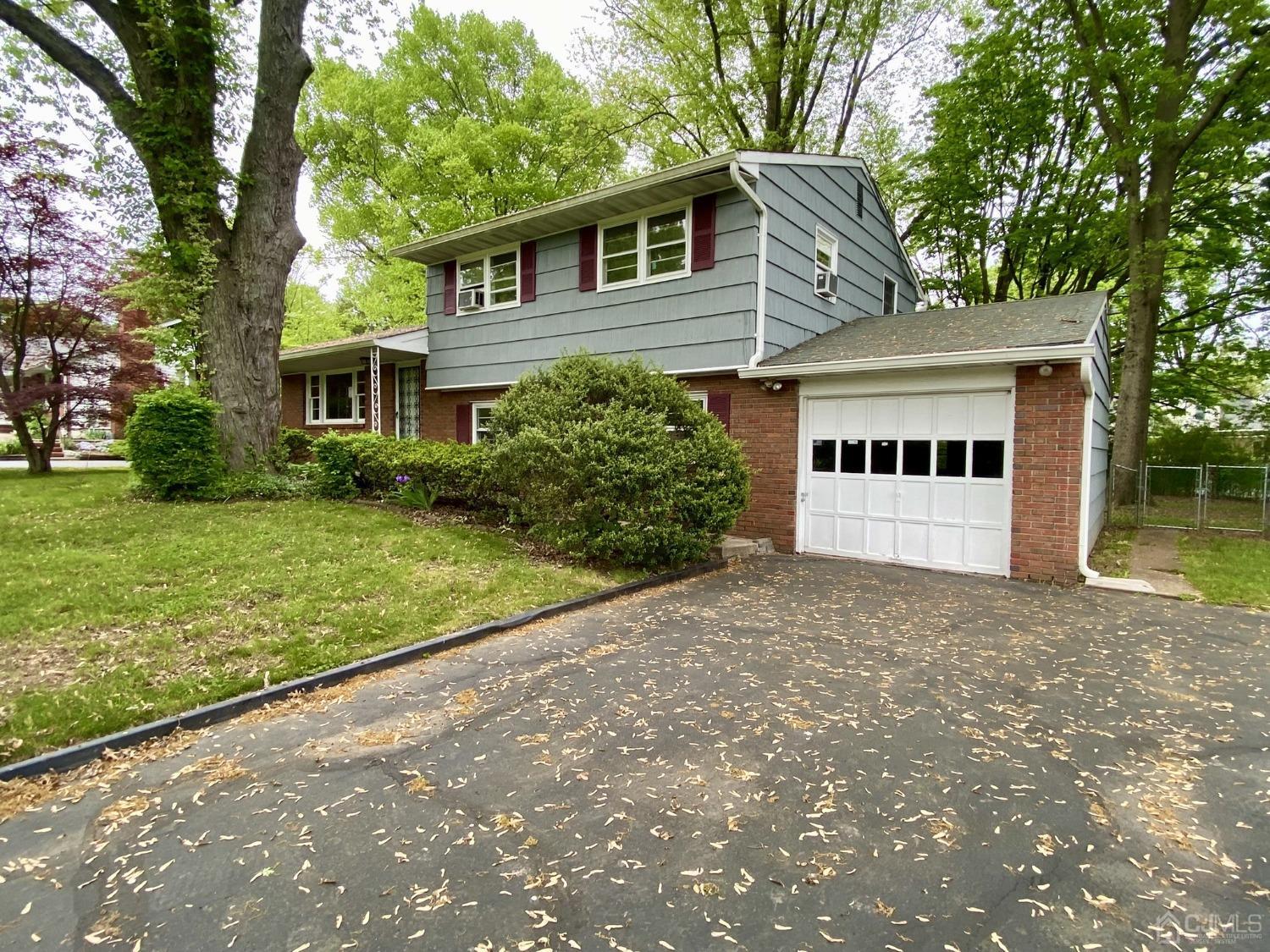 12 Federal City Road Ewing, NJ 08638 - Photo 2 of 16 a house with trees in front of it