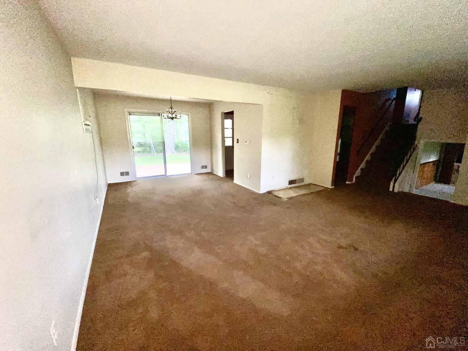 12 Federal City Road Ewing, NJ 08638 - Photo 3 of 16 a view of an empty room with closet and a window