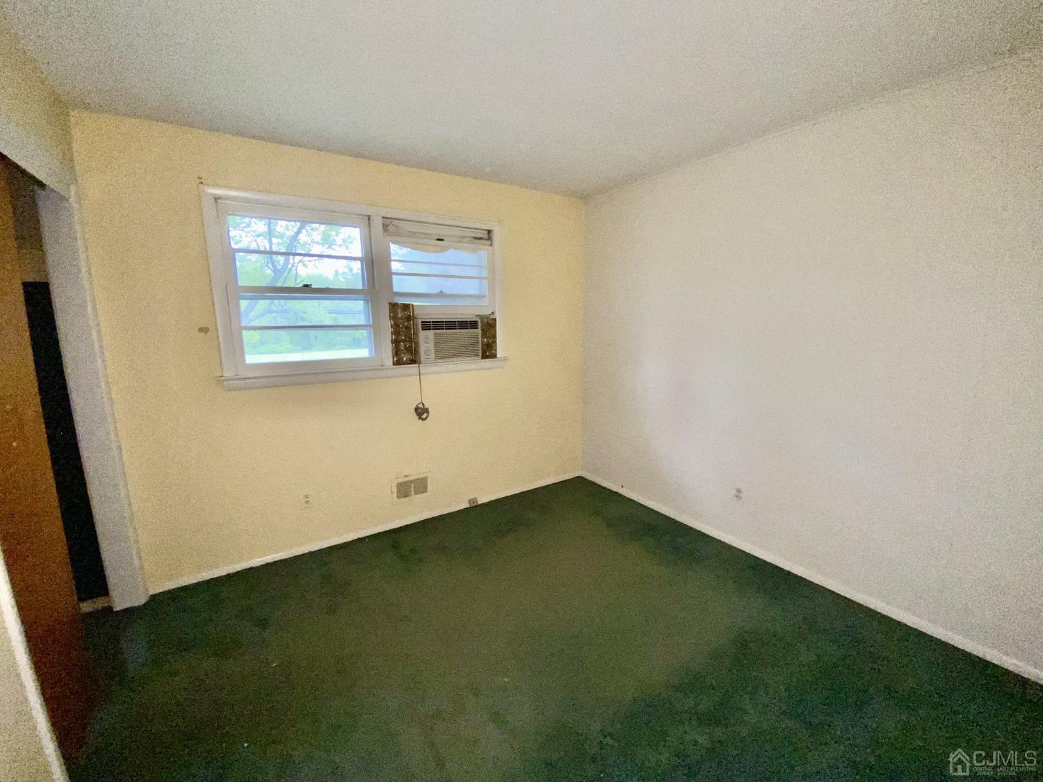 12 Federal City Road Ewing, NJ 08638 - Photo 6 of 16 a view of an empty room with a window