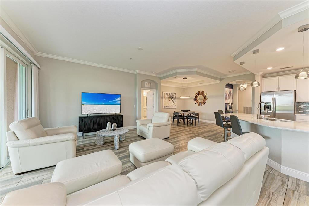 7374 Divot Loop Bradenton, FL 34202 - Photo 13 of 43 a living room with furniture and a large window