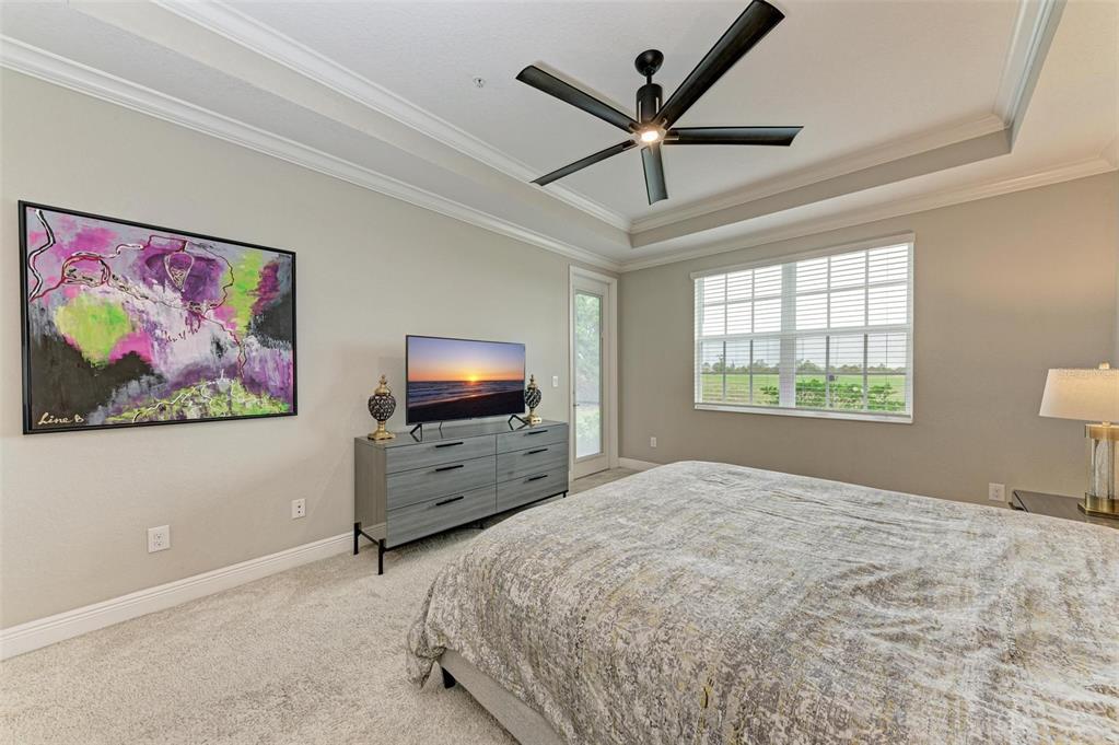 7374 Divot Loop Bradenton, FL 34202 - Photo 14 of 43 a bedroom with furniture and a window
