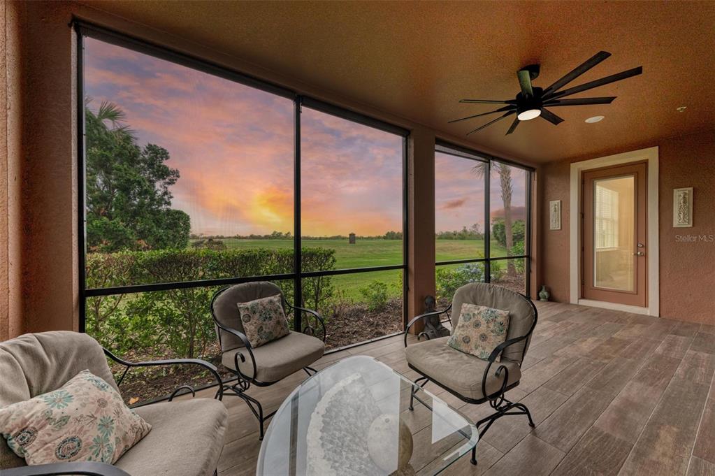 7374 Divot Loop Bradenton, FL 34202 - Photo 2 of 43 a living room with furniture and a large window