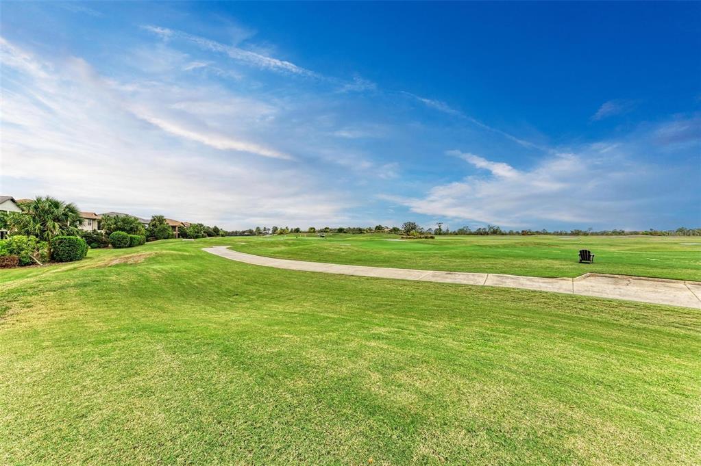 7374 Divot Loop Bradenton, FL 34202 - Photo 26 of 43 a view of an ocean and beach