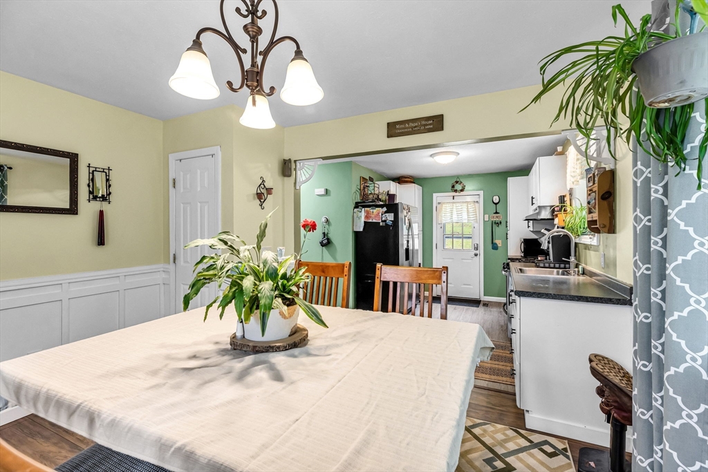 302 Middlefield Road Chester, MA 01011 - Photo 9 of 42 a view of a dining room with furniture