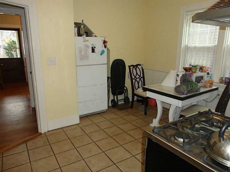 20 Langham Road Providence, RI 02906 - Photo 9 of 16 Kitchen. kitchen with butler s pantry with sink, dishwasher, counter, cabinets.