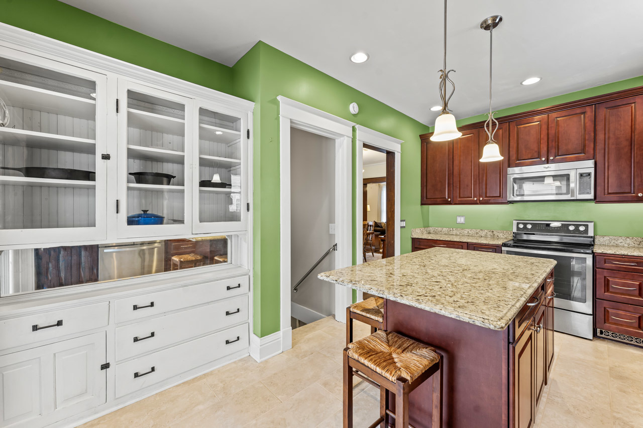 15405 Joliet Road Plainfield, IL 60544 - Photo 12 of 34 a kitchen that has a cabinets and a stove