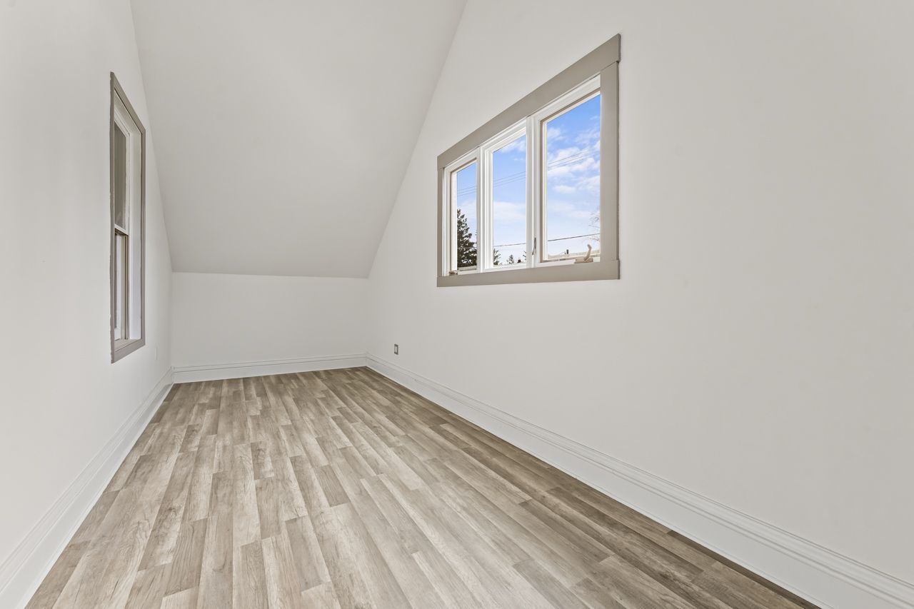 15405 Joliet Road Plainfield, IL 60544 - Photo 16 of 34 a view of a room with wooden floor and window
