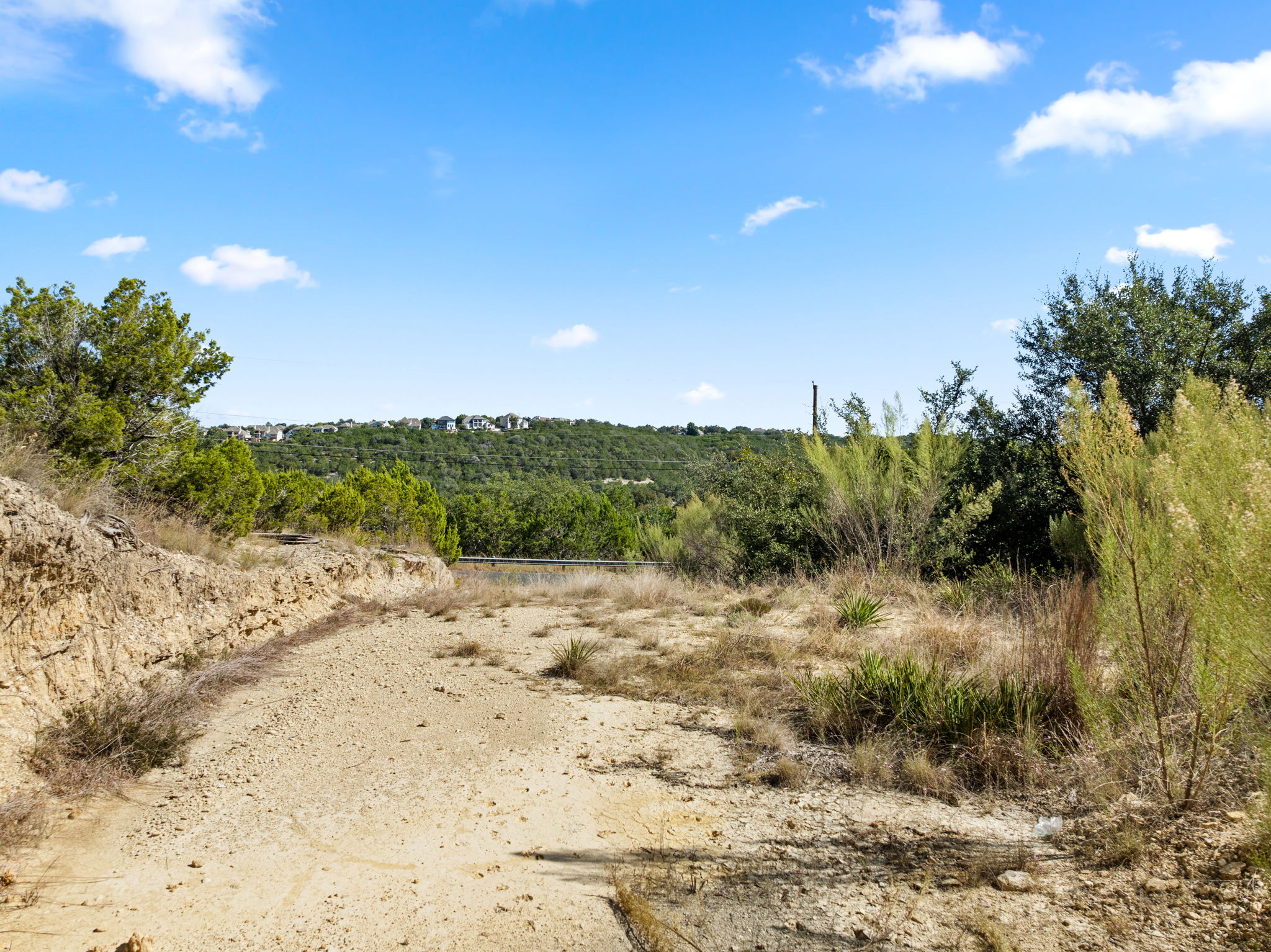 13701 Hunters Pass Austin, TX 78734 - Photo 11 of 33 a view of a beach with a large tree