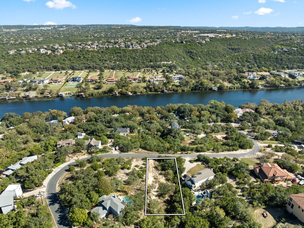 13701 Hunters Pass Austin, TX 78734 - Photo 17 of 34 an aerial view of residential houses with outdoor space