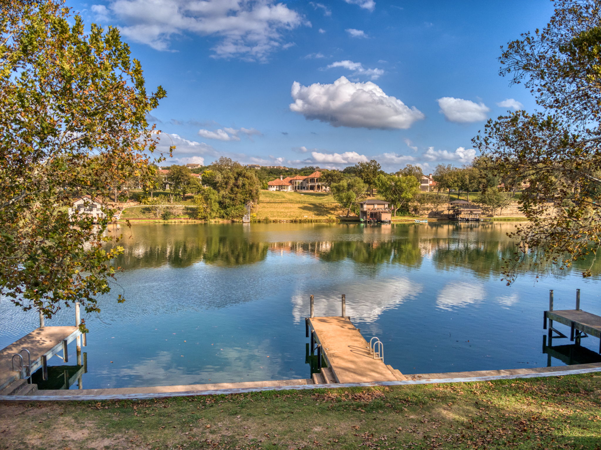 13701 Hunters Pass Austin, TX 78734 - Photo 22 of 33 a view of a lake with houses