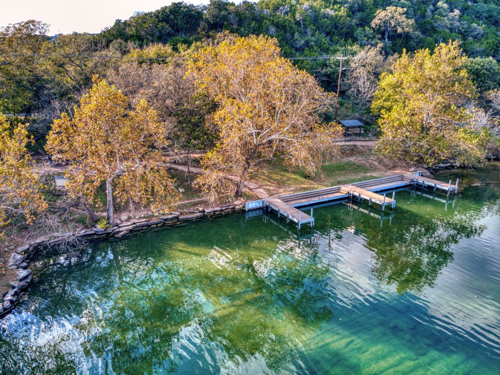 13701 Hunters Pass Austin, TX 78734 - Photo 26 of 33 an aerial view of a house with a yard basket ball court and outdoor seating