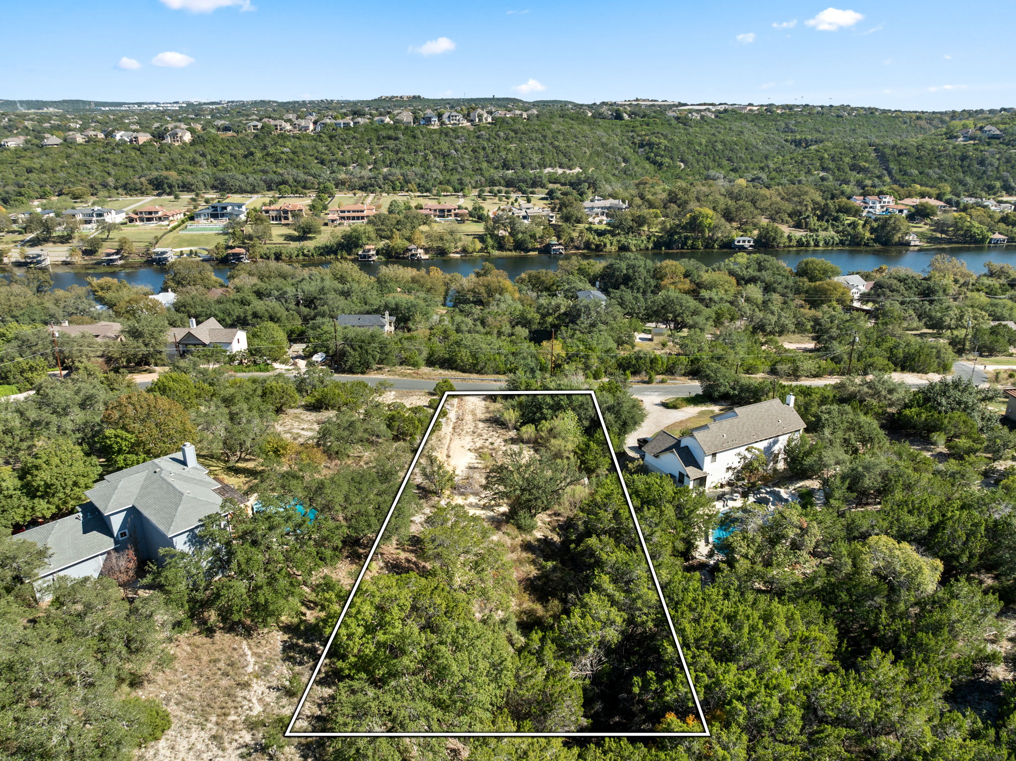 13701 Hunters Pass Austin, TX 78734 - Photo 3 of 33 an aerial view of residential houses with outdoor space and trees