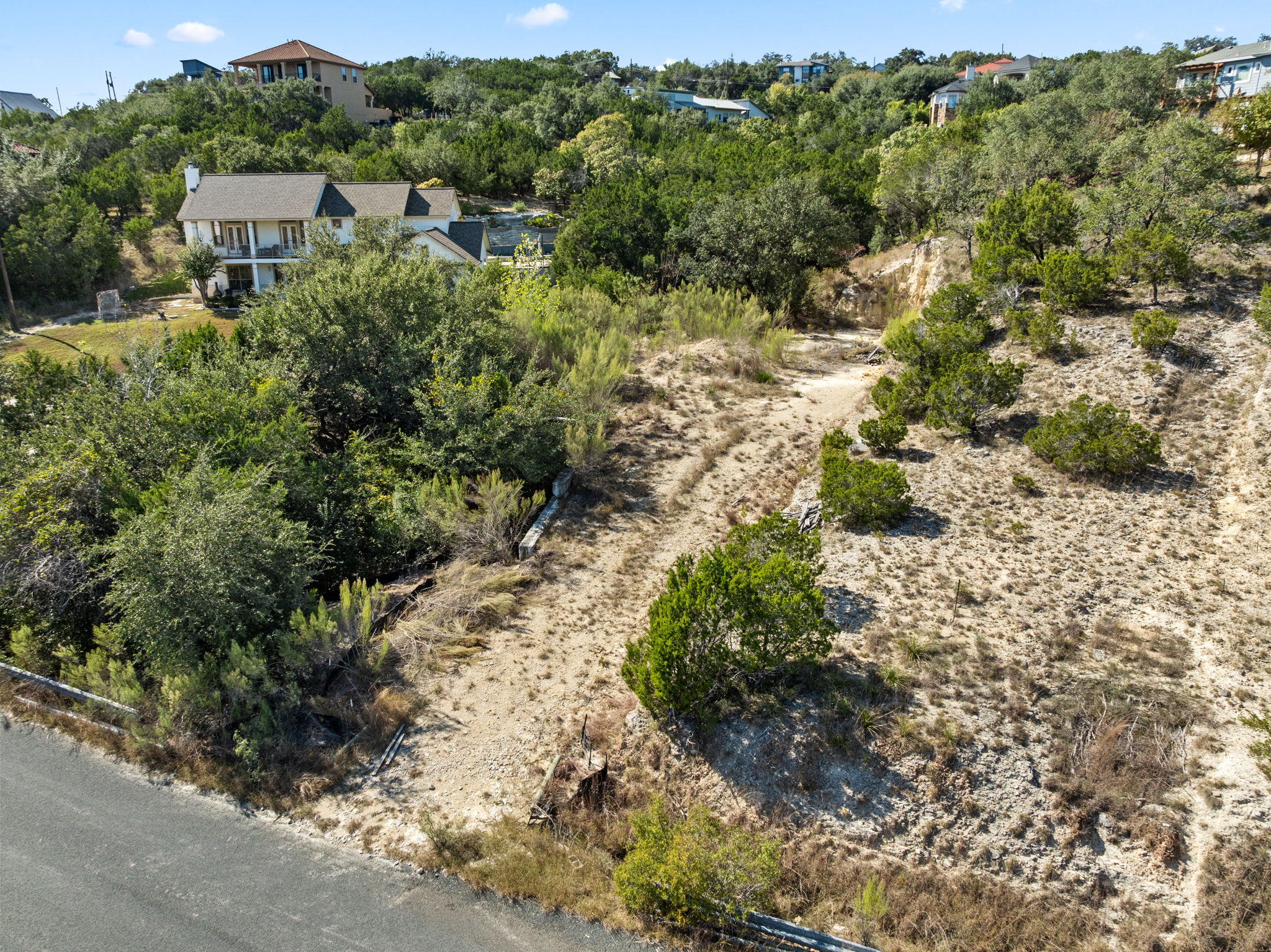 13701 Hunters Pass Austin, TX 78734 - Photo 5 of 33 a view of a large yard with lots of green space