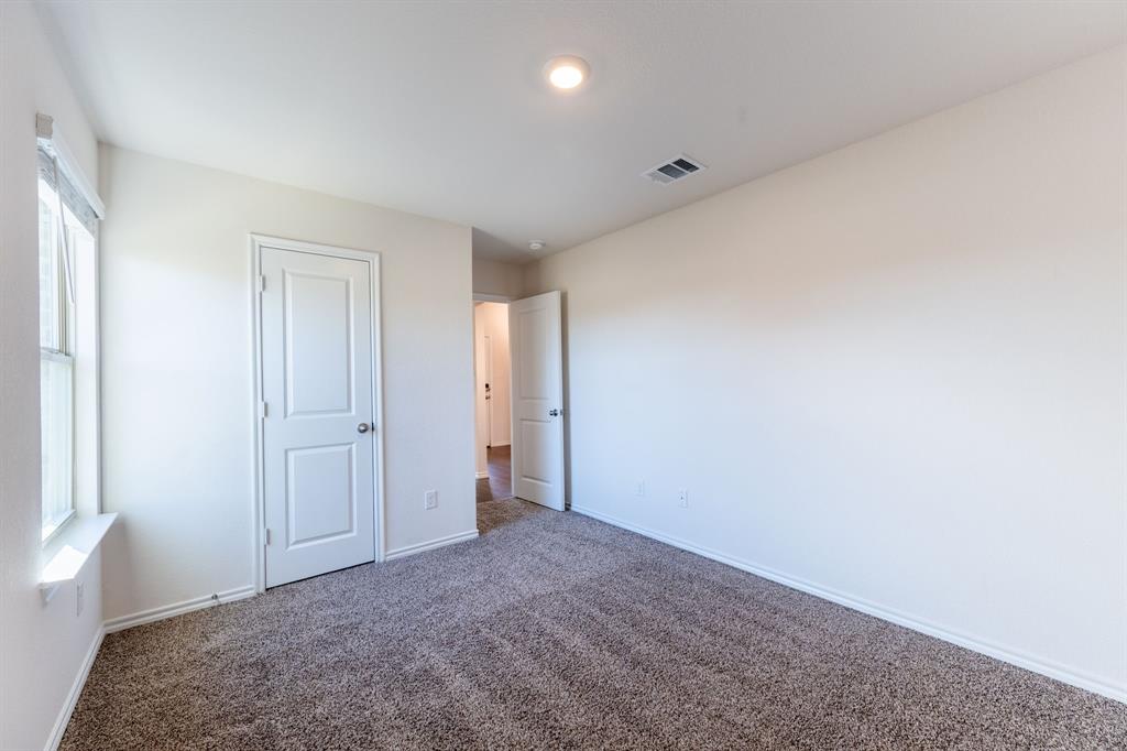 2101 Brisbon Street Fate, TX 75189 - Photo 26 of 39 a view of an empty room and window