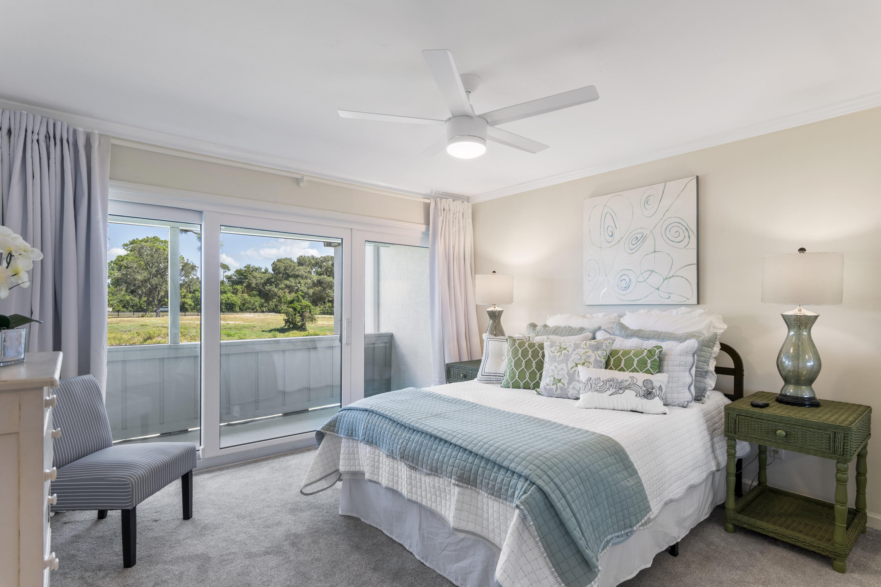 4300 Bay Point Road, Unit 402 Panama City Beach, FL 32408 - Photo 20 of 34 a bedroom with a bed and a large window