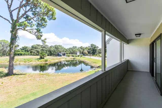a view of swimming pool with outdoor space and seating area