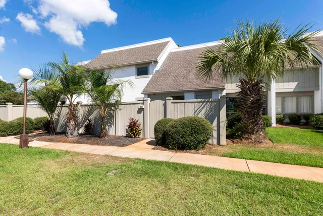 a house view with a garden space