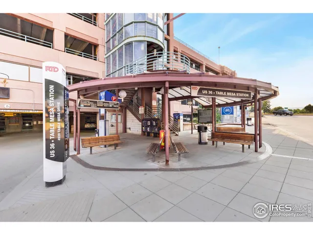 a view of a building with sitting area