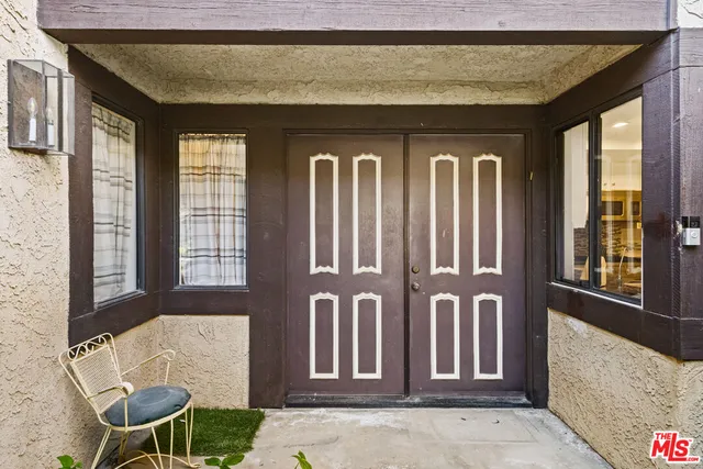 a view of front door of house and front door