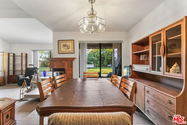 a very nice looking living room with a large window