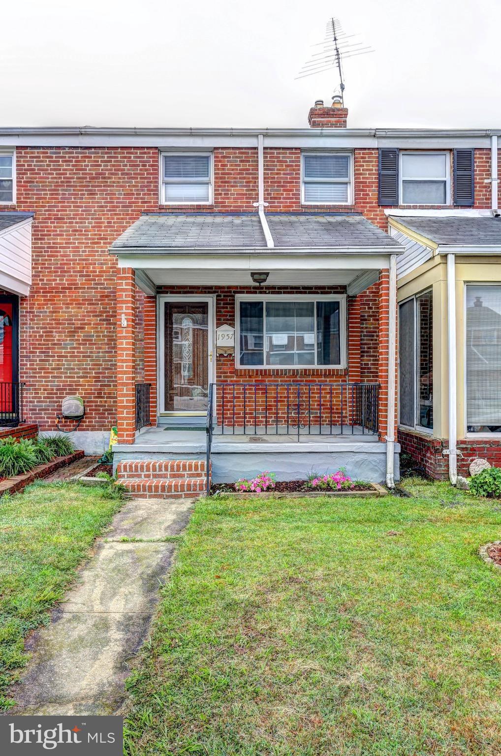 1957 Holborn Road Baltimore, MD 21222 - Photo 2 of 25 a view of front of a house with a yard