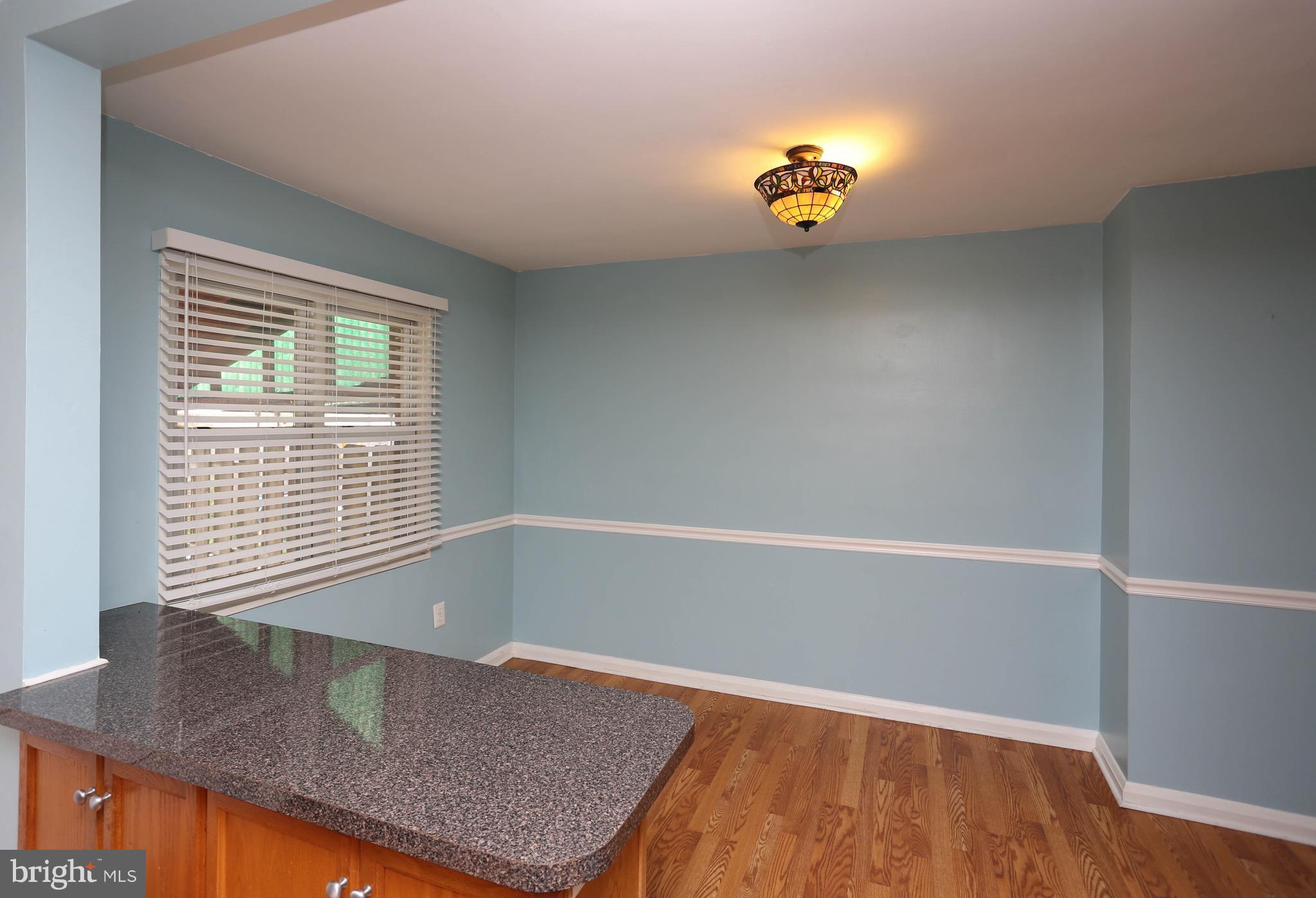 1957 Holborn Road Baltimore, MD 21222 - Photo 12 of 25 a view of an empty room with a window