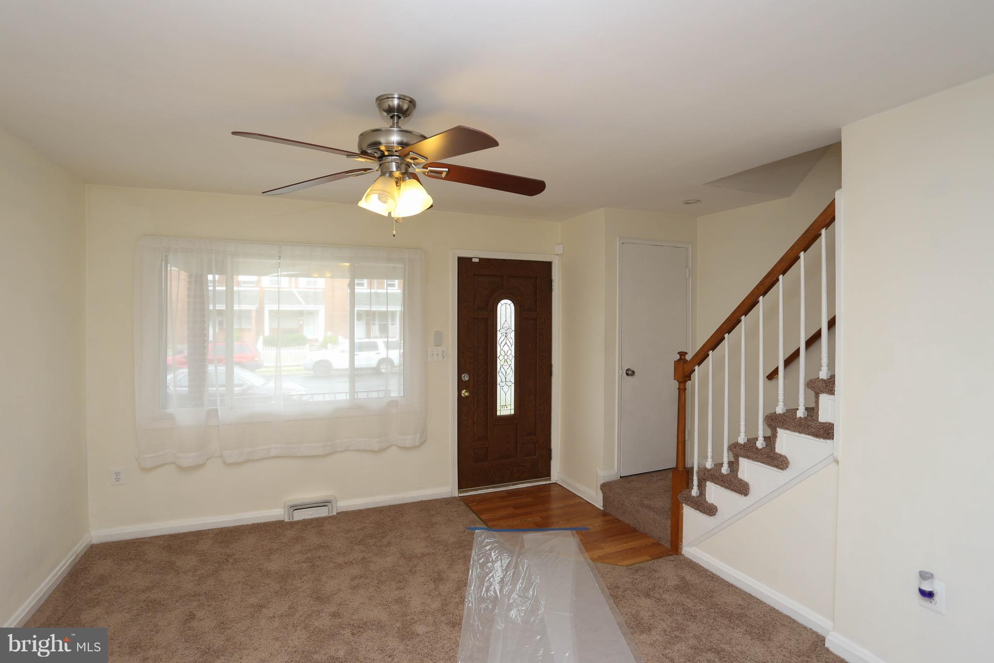 1957 Holborn Road Baltimore, MD 21222 - Photo 3 of 25 a view of an empty room with a window