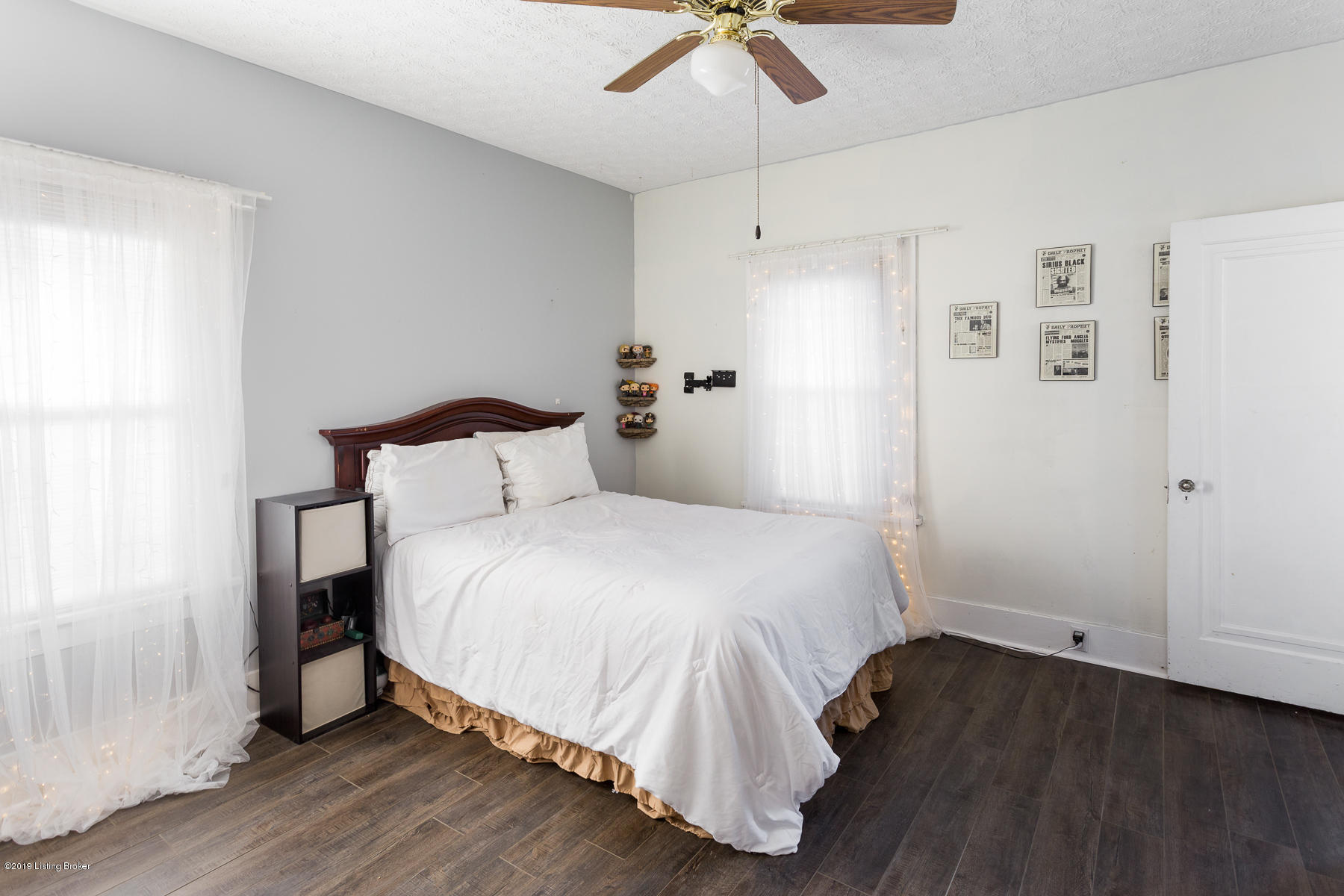 318 Iola Road Louisville, KY 40207 - Photo 13 of 28 First Floor Bedroom with newly installed Smart Core, Savannah Oak Vinyl Flooring.