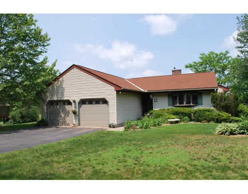 780 Bay Road Amherst, MA 01002 - Photo 1 of 1 a front view of a house with garden