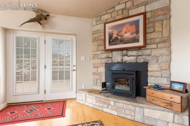 a view of a livingroom with furniture and a fireplace