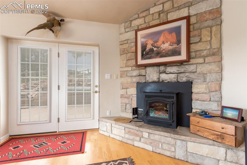 6670 Zercher Road Beulah, CO 81023 - Photo 14 of 41 a view of a livingroom with furniture and a fireplace