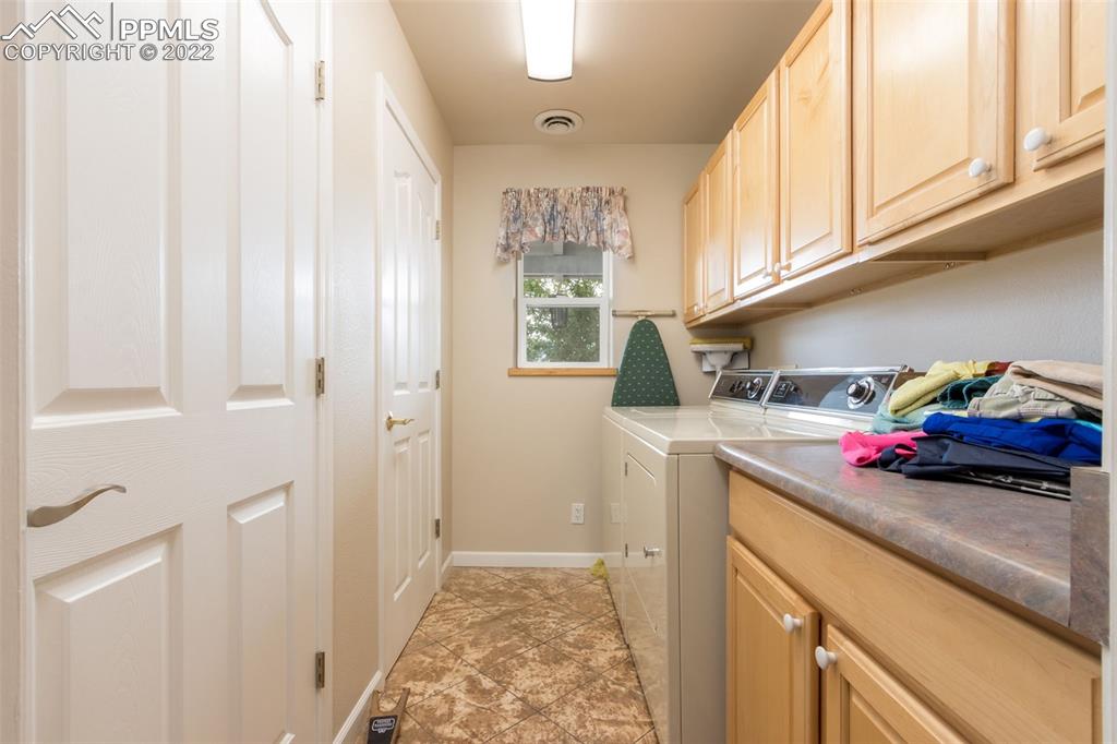 6670 Zercher Road Beulah, CO 81023 - Photo 19 of 41 a utility room with sink dryer and washer