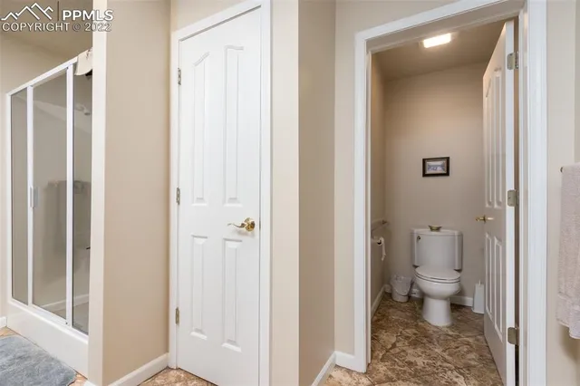 a view of a bathroom with a toilet sink