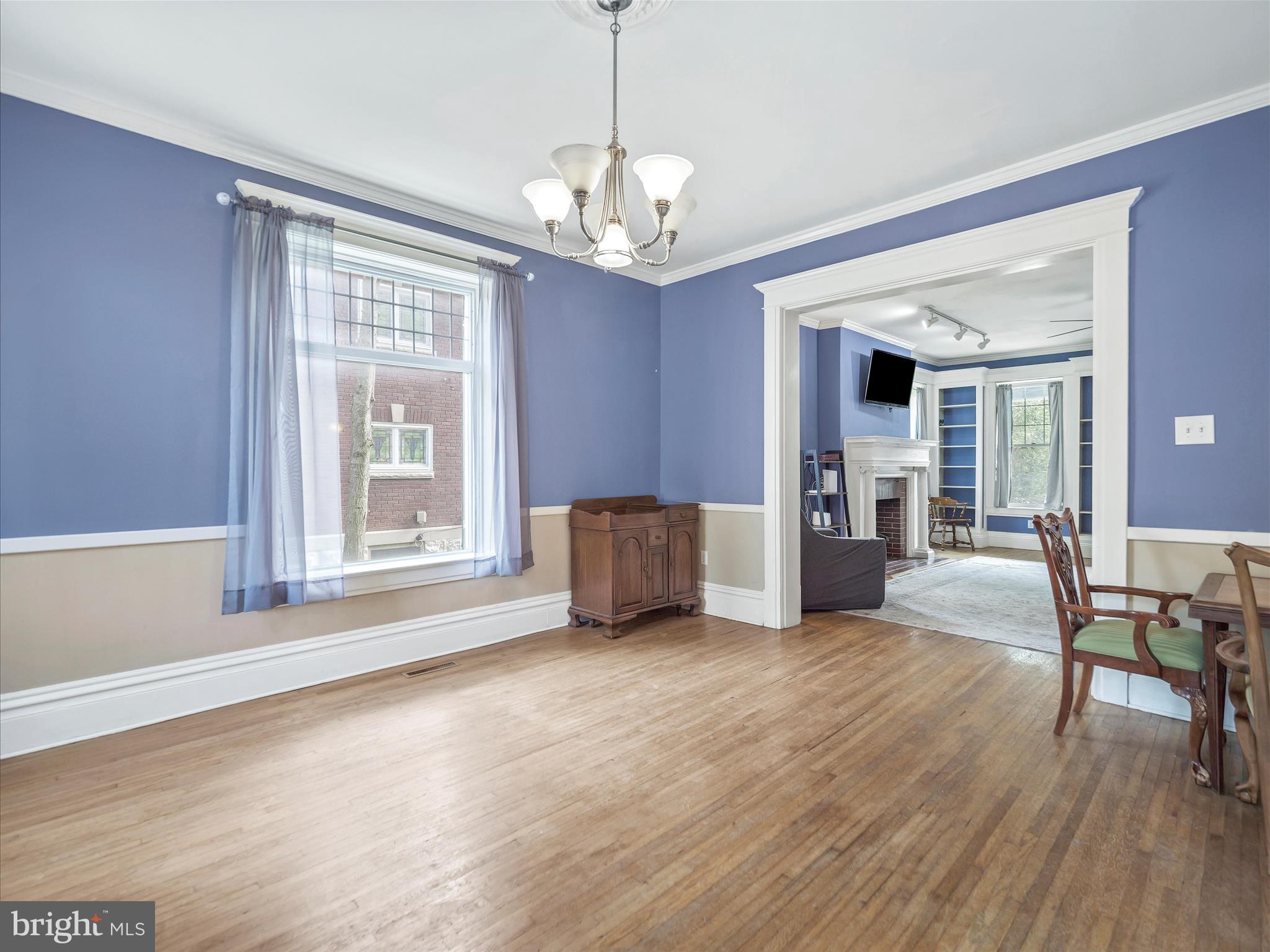 223 East 3rd Street Waynesboro, PA 17268 - Photo 11 of 42 a living room with furniture and a chandelier
