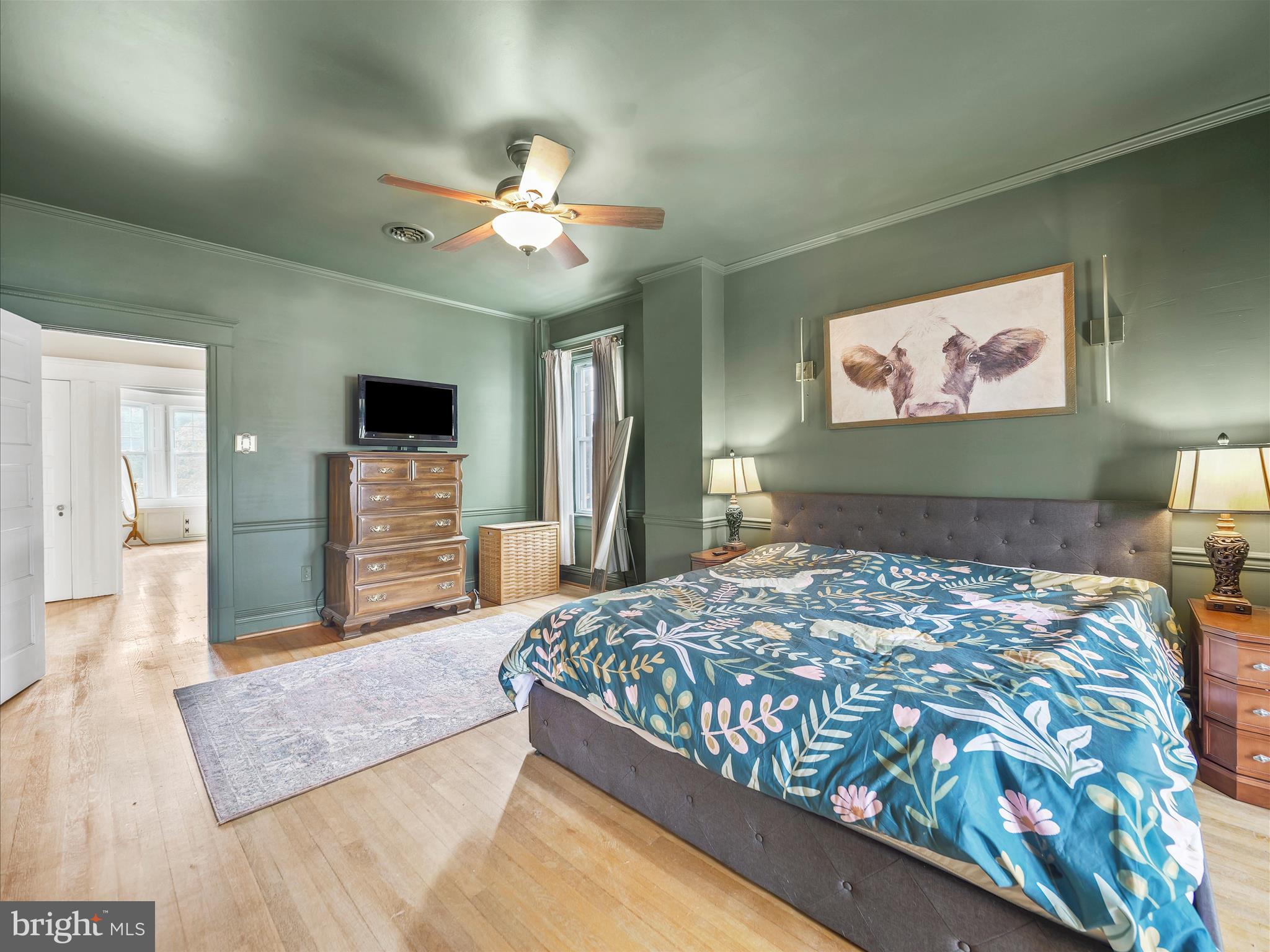 223 East 3rd Street Waynesboro, PA 17268 - Photo 28 of 42 a bedroom with a bed and a chandelier