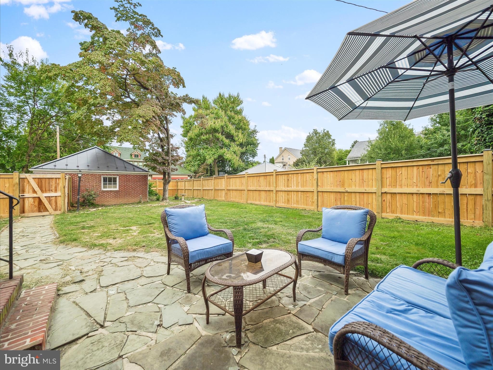 223 East 3rd Street Waynesboro, PA 17268 - Photo 3 of 42 a view of a yard with furniture