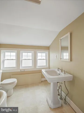a bathroom with a sink and a bathtub