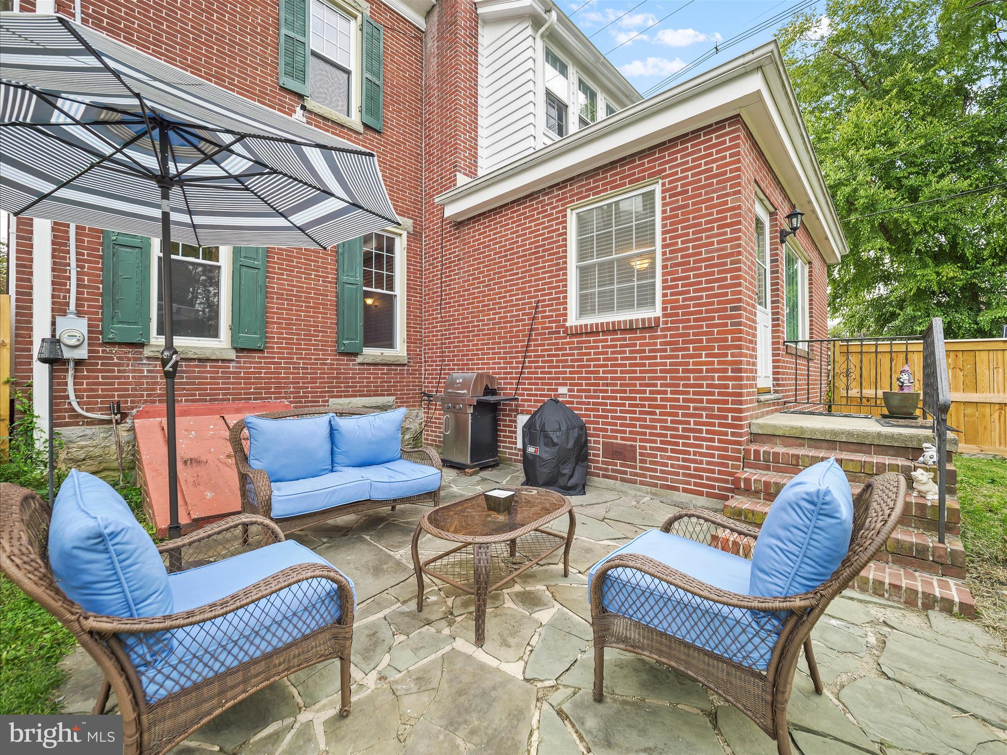 223 East 3rd Street Waynesboro, PA 17268 - Photo 33 of 42 a view of a patio with couches chairs and a fire pit