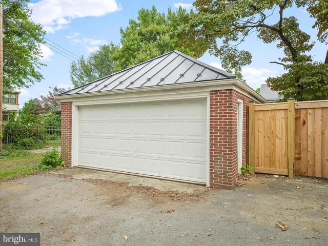 a small white house with a outdoor space
