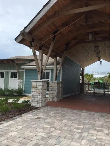 a view of a chairs and table in the patio
