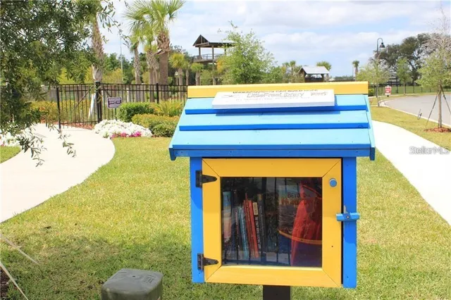 a view of swimming pool with a patio