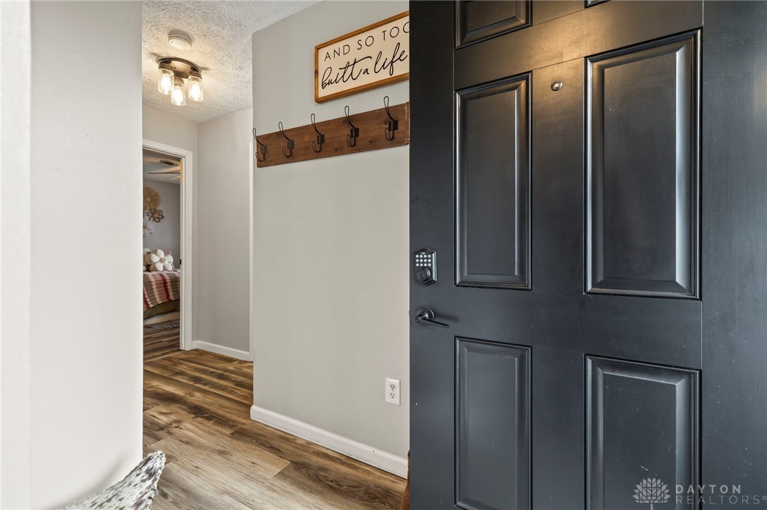 8969 Franklin-Trenton Road Franklin, OH 45005 - Photo 23 of 49 The inviting entryway features durable flooring and convenient storage, creating a welcoming first impression.
