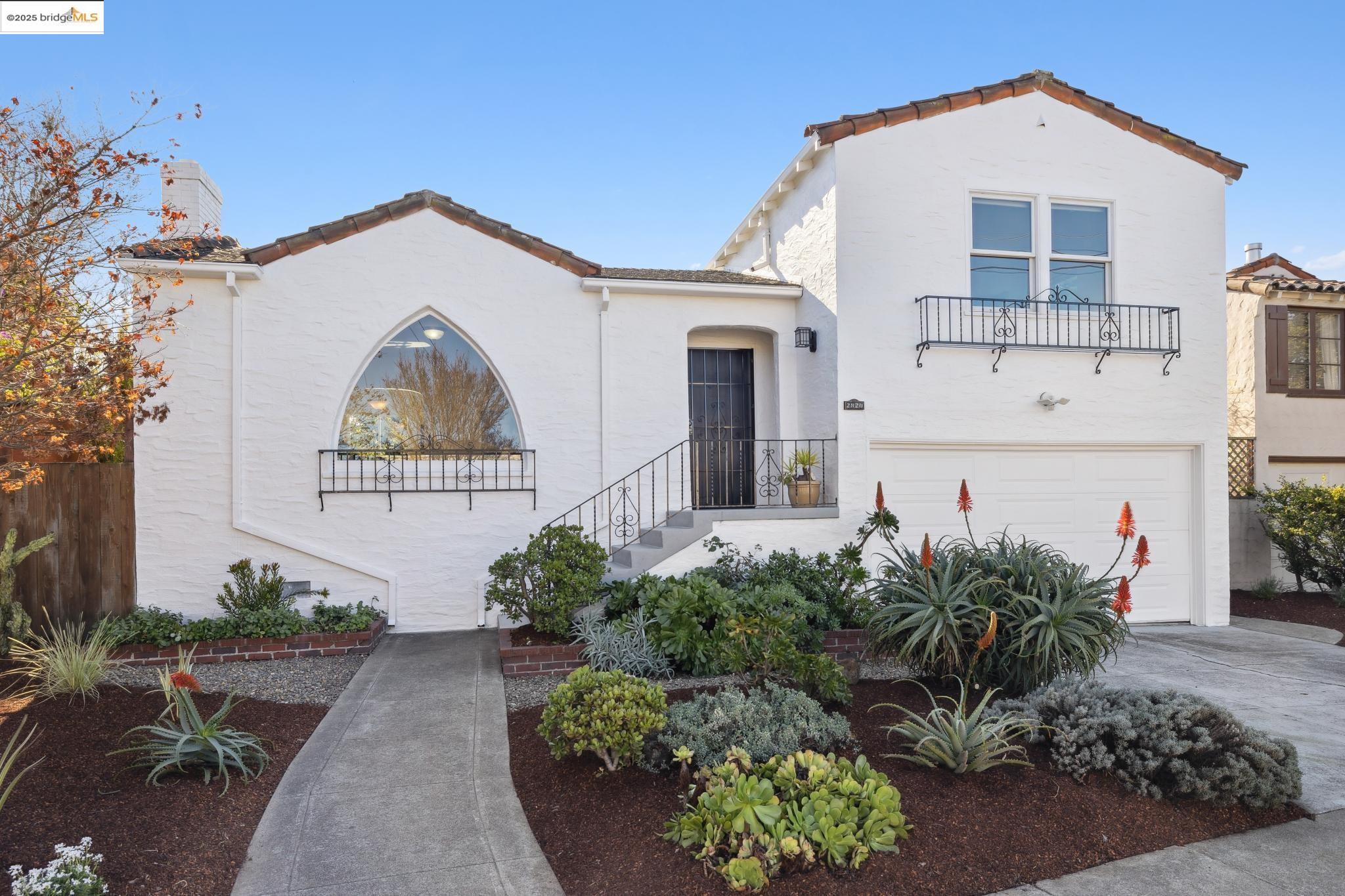 2820 Grant Avenue Richmond, CA 94804 - Photo 1 of 1 a front view of a house with garden